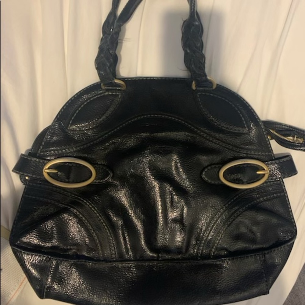 Black patent leather Tods tote bag.